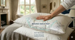 A hand pressing into the pillow to show the quick recovery and bounce-back quality of the high-grade filling.