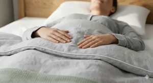 A back sleeper lying on a medium firm pillow showing optimal spinal alignment and shoulder positioning.