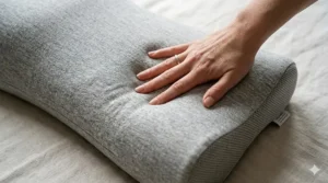 Close-up detail of high-density memory foam used in a pillow for lower back pain.
