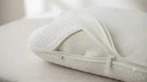 Detailed view of a removable, washable cover on a pressure relief pillow.