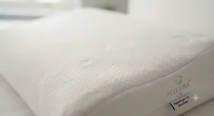 Close-up of breathable, hypoallergenic fabric on the pillow surface.
