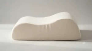 Side view of an ergonomic leg elevation pillow showing the 45-degree angle.