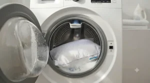 Graphic showing a junior pillow being easily cleaned in a home washing machine.