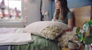 An eco-friendly, British-made wool pillow offering breathable comfort for a teenager's bed.