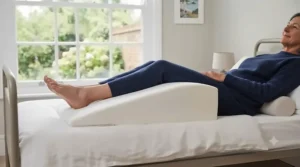 Therapeutic wedge pillow used for offloading pressure on sensitive areas.