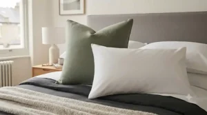 Size comparison of a large European square pillow next to standard UK bed pillows[cite: 5]