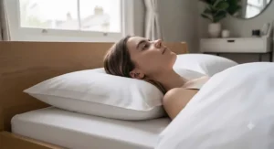 A medium-support standard pillow cradling the head and neck of a back sleeper.