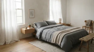 Plain dyed grey cotton housewife pillowcases complementing contemporary bedroom decor